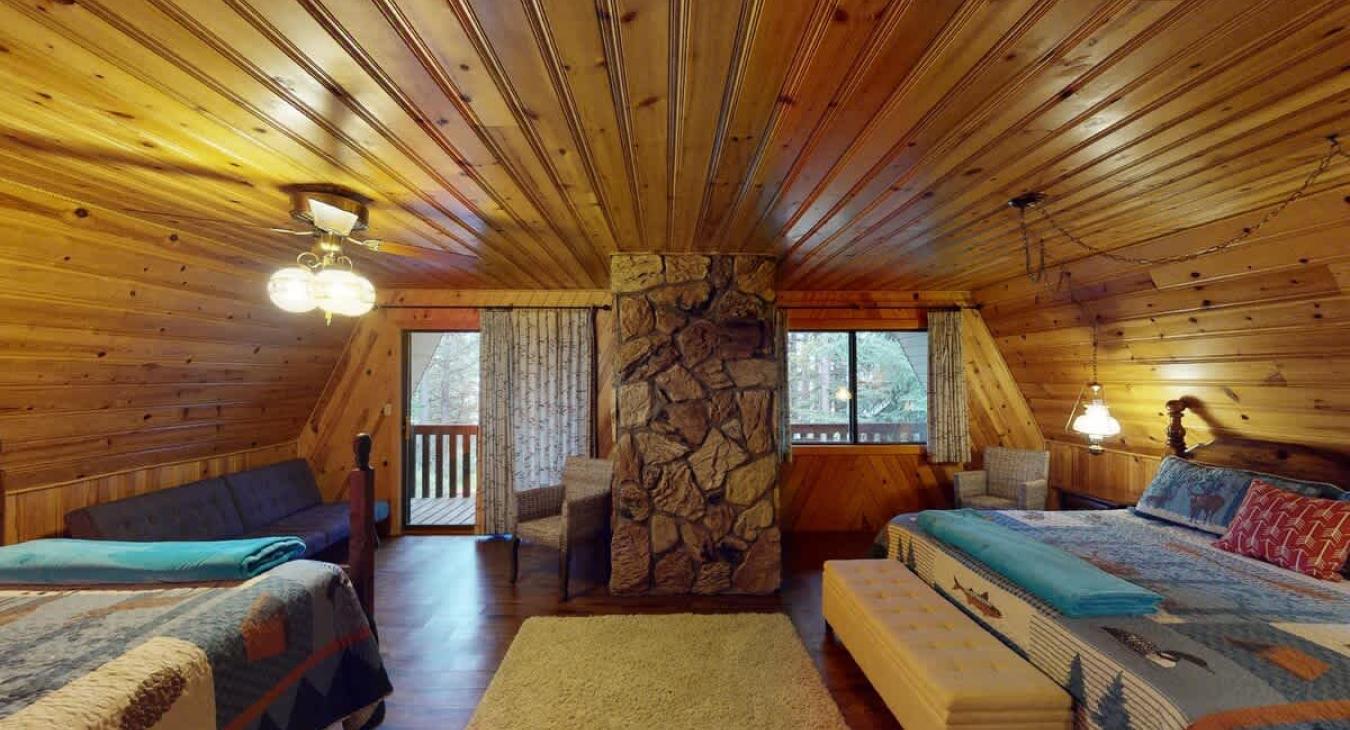 Upstairs loft with couch and seating.