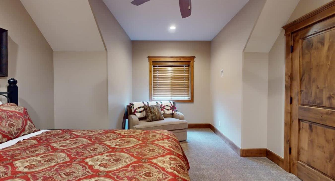 This room is very spacious with seating to relax after a long day.