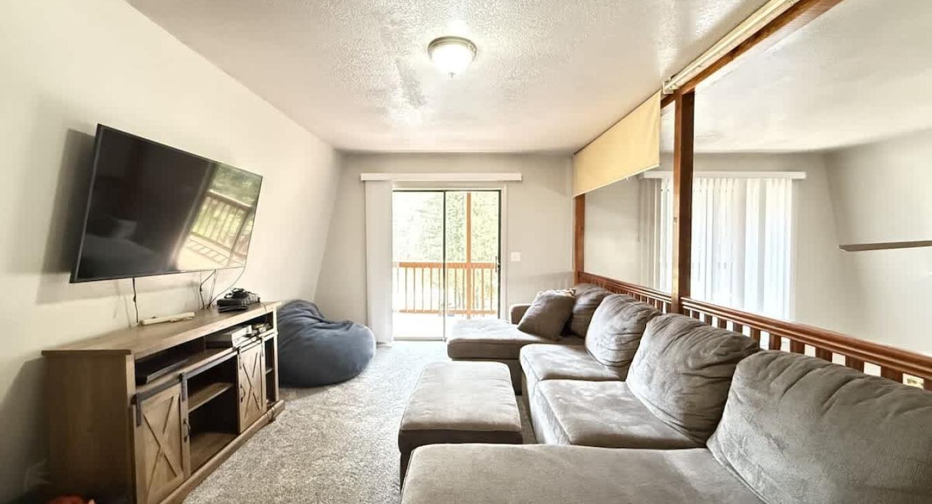 Full size couch upstairs to seat guests during your stay.