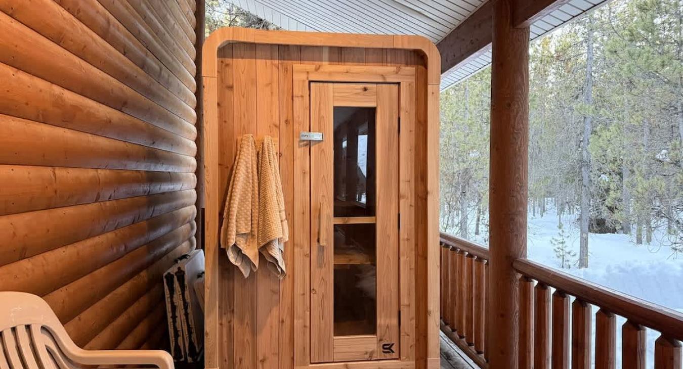 An outdoor sauna is available for your use at this cabin.