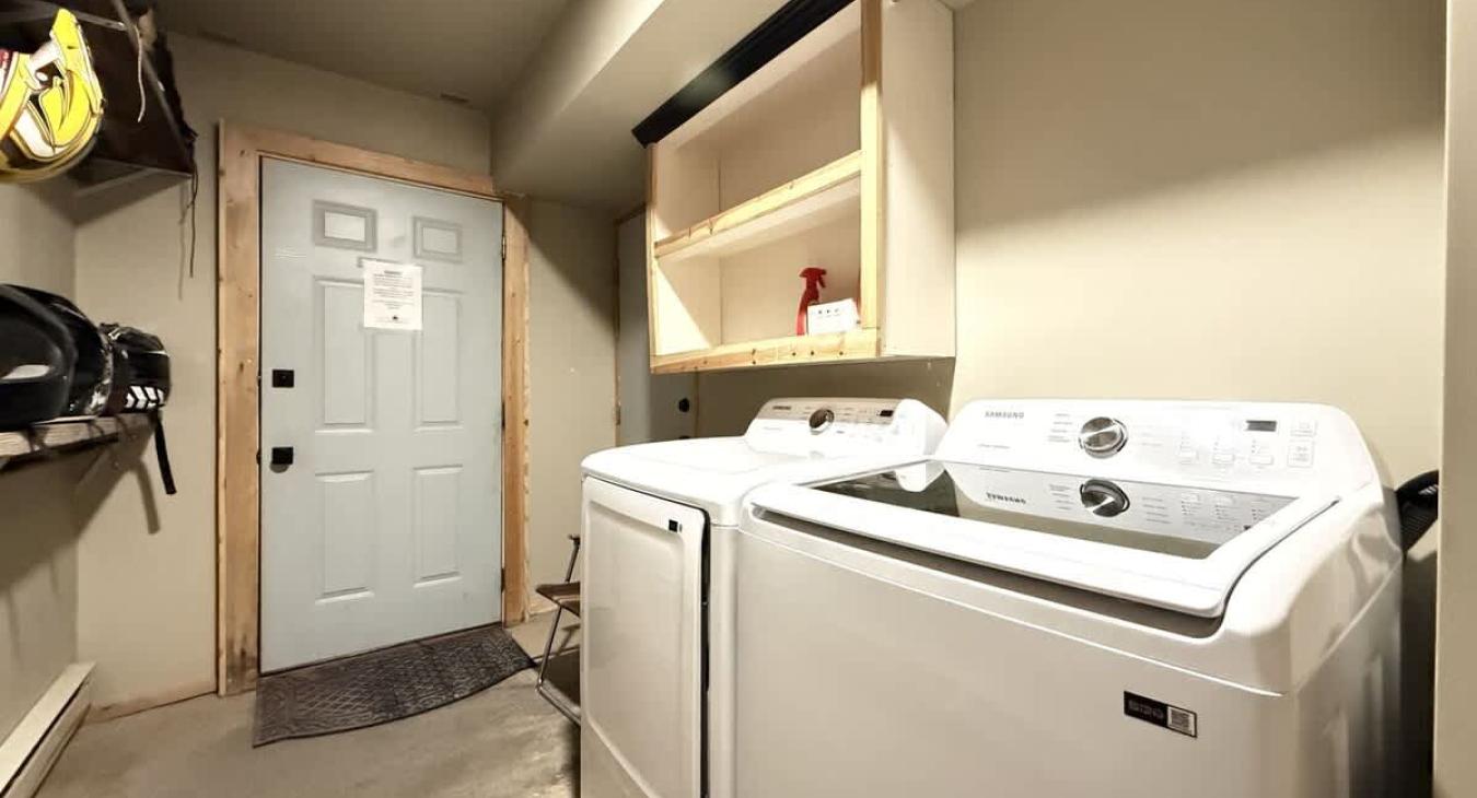 Downstairs there is a washer and dryer for you to use with laundry soap provided.