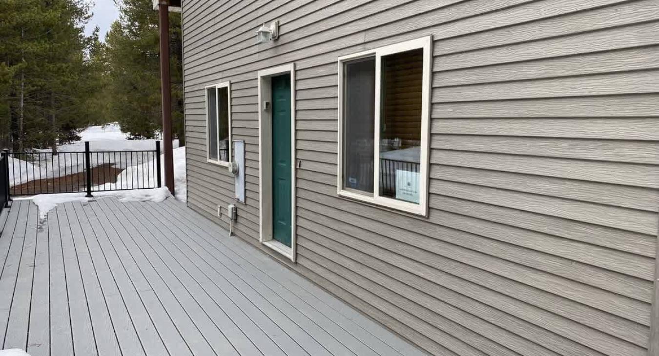 Outdoor deck with the entrance door.