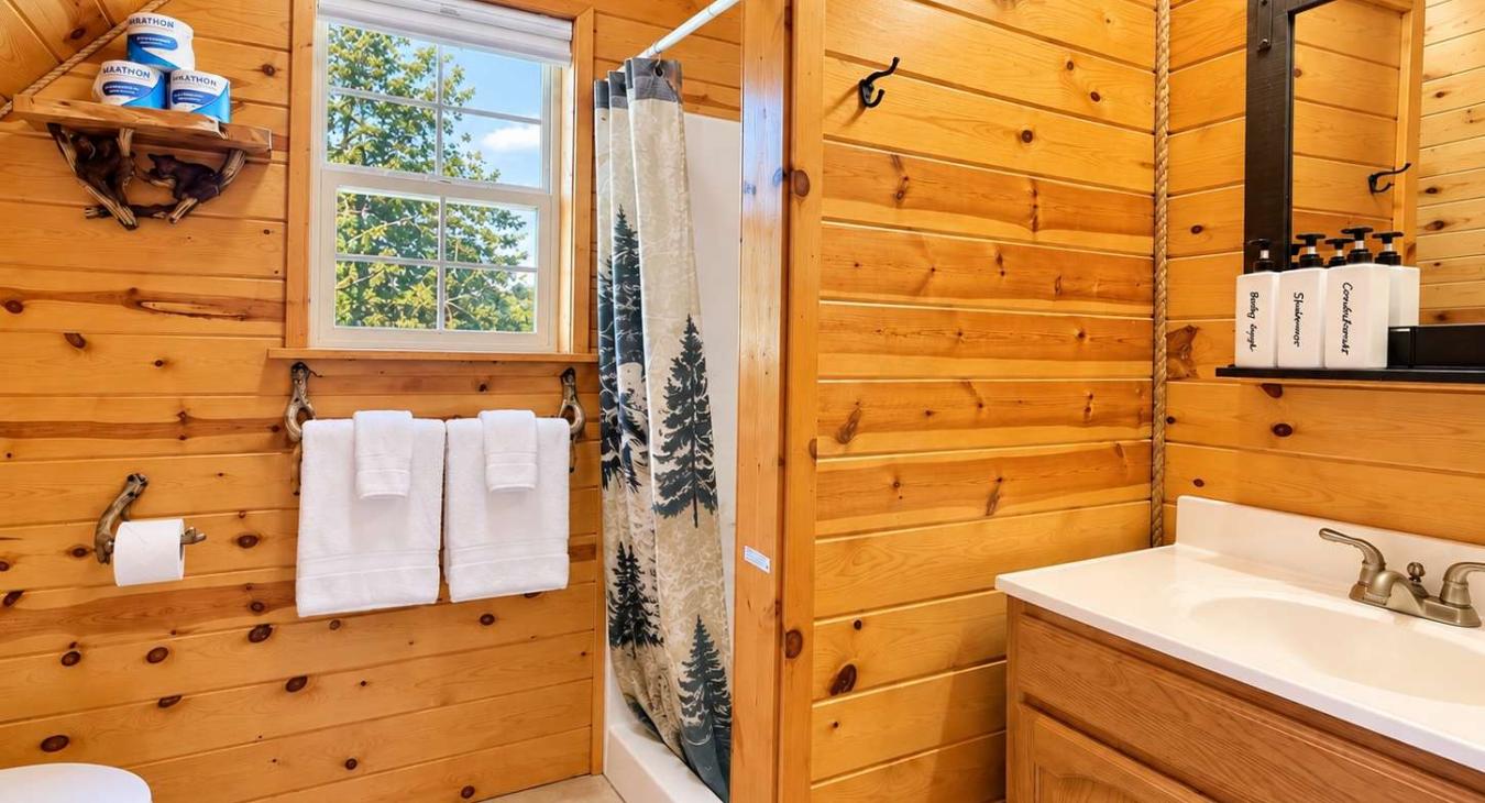 Upstairs 3/4 bathroom with Shampoo, Conditioner and Body Wash.