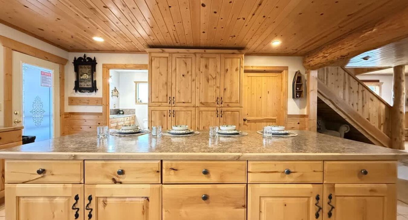 Large kitchen island that seats 4 comfortably.