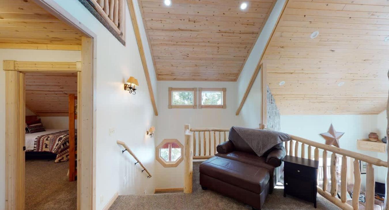 Corner of the loft with an armchair.