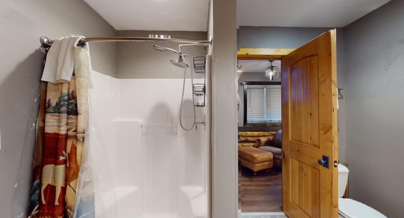 Standing shower in the downstairs bathroom #1.