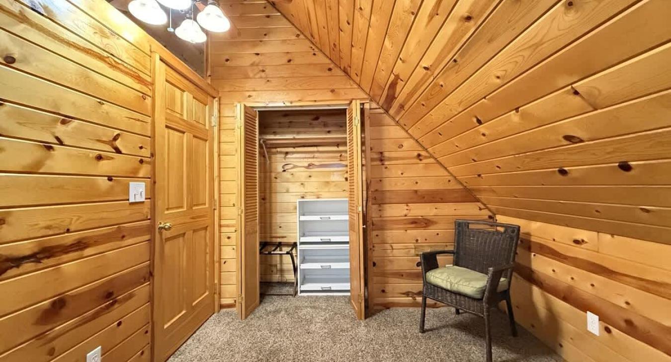 Bedroom #2 located upstairs with a Queen size bed.