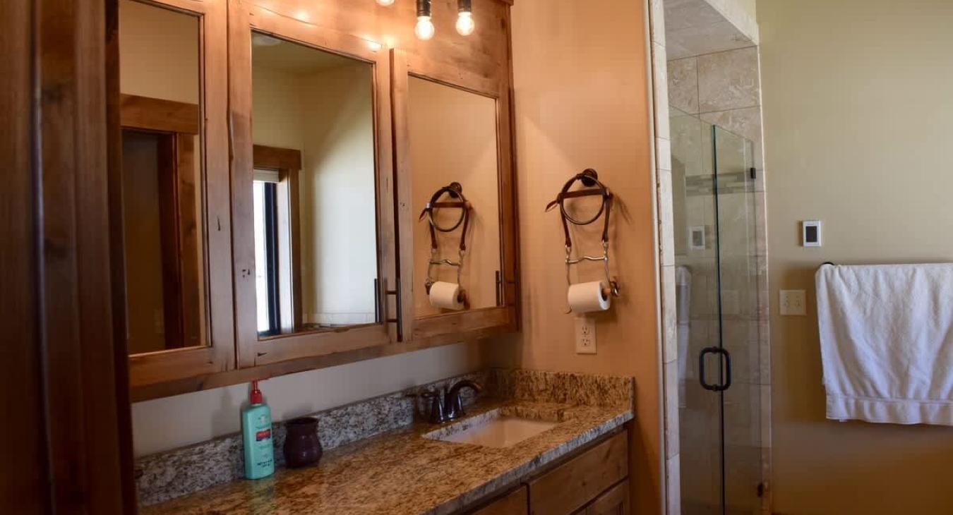 Ensuite Master bathroom with double vanity and standing shower.