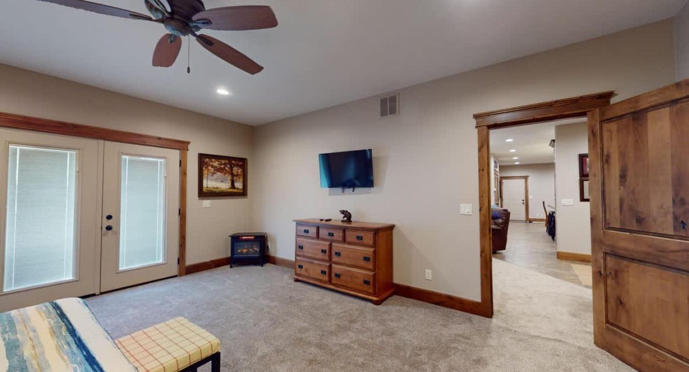 Spacious master bedroom to relax during your stay.