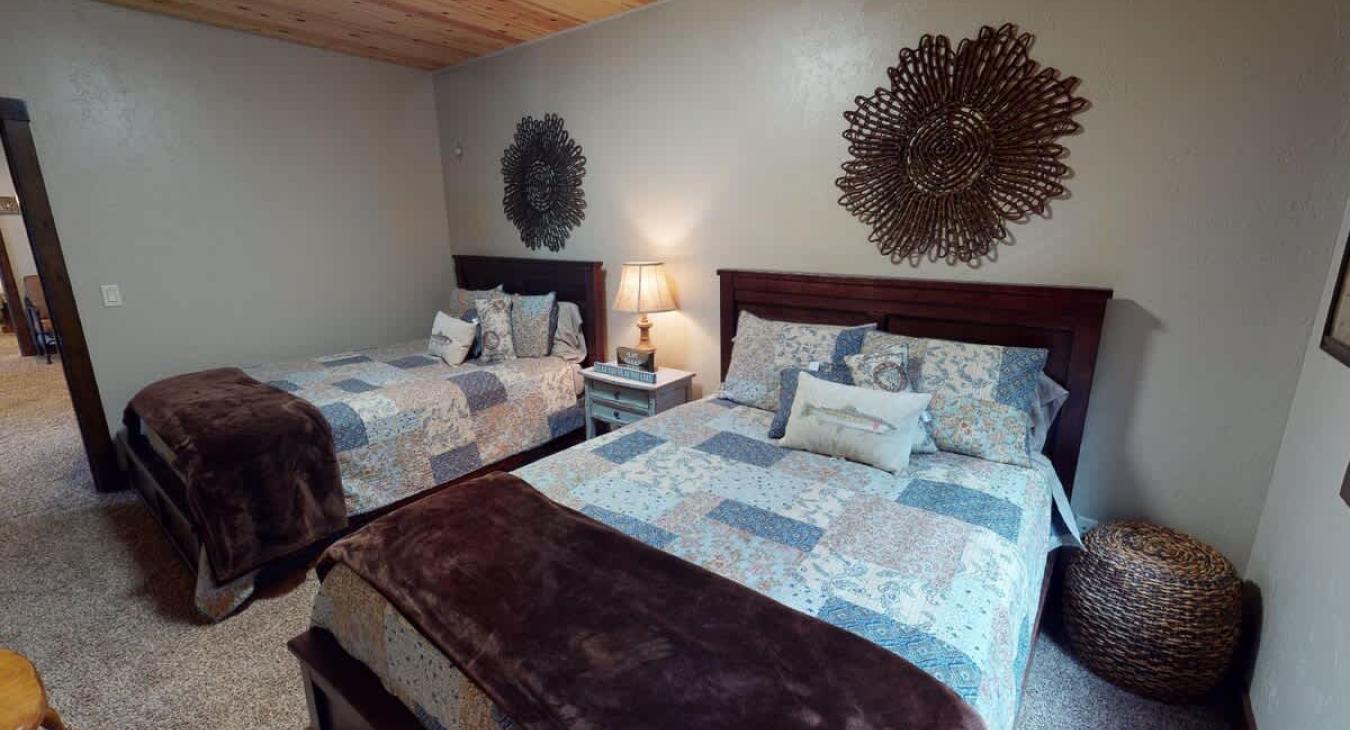 1st Bedroom downstairs with 2 Queen beds.