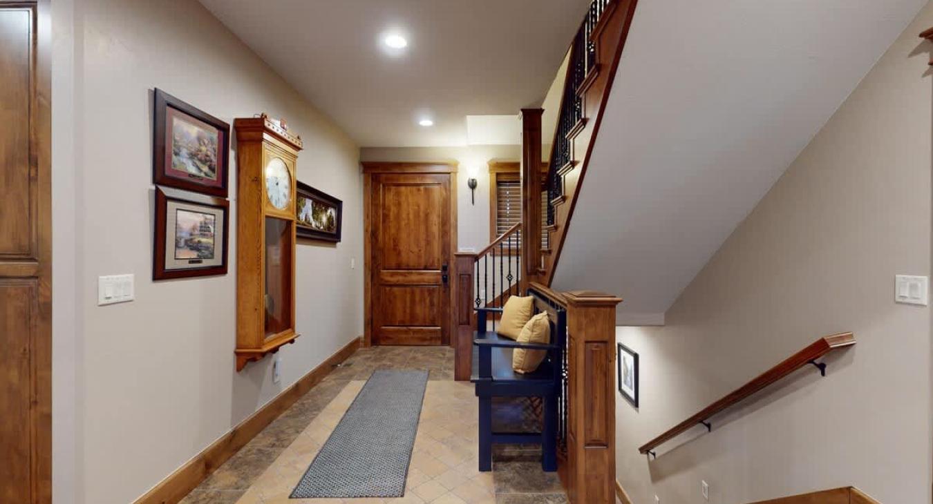 Access the upstairs level from the stairs pictured here.