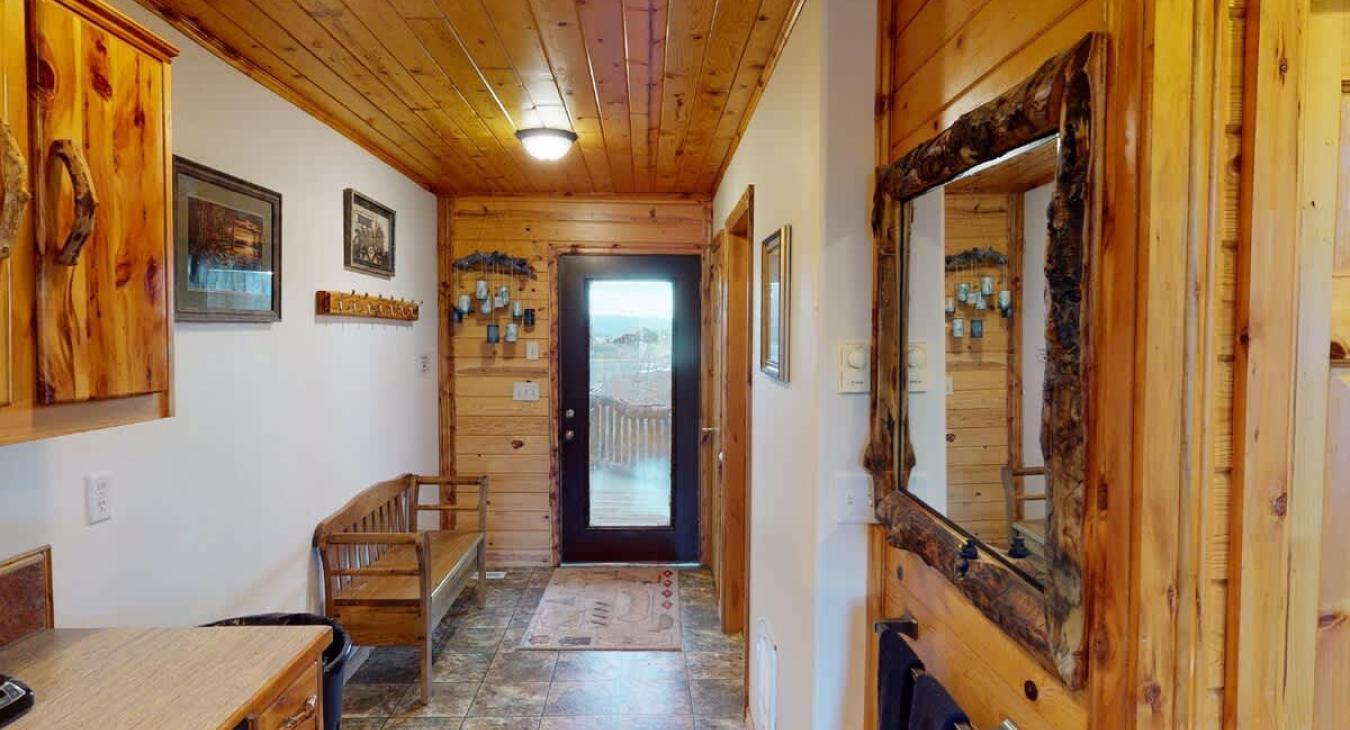 Hallway with access to the back deck.