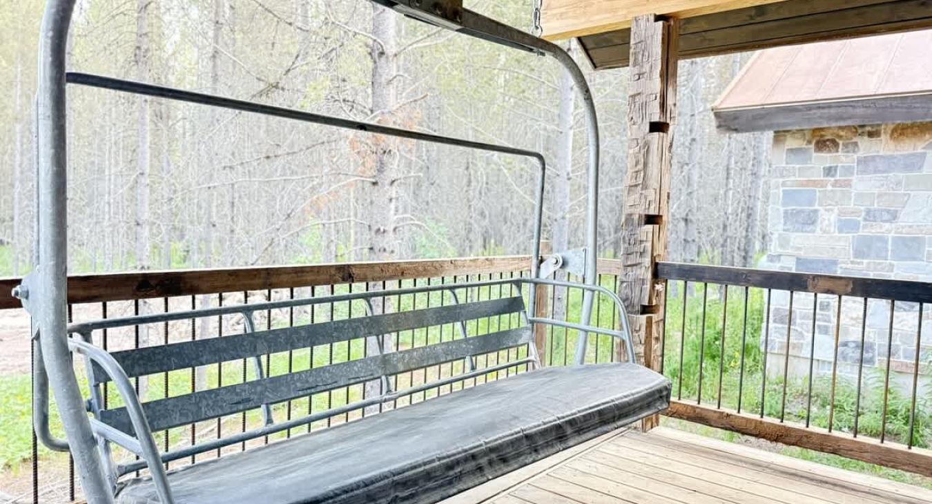 Sit on the porch on this vintage ski lift swing.