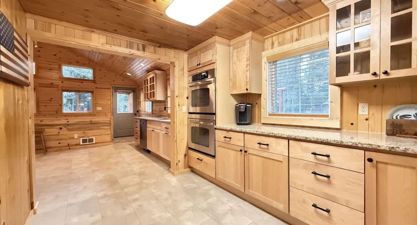 Large secondary kitchen area. Lots of countertops for food prep.