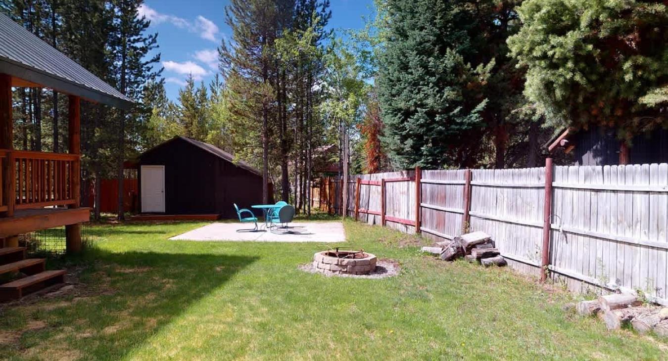 Seating and firepit located outside.