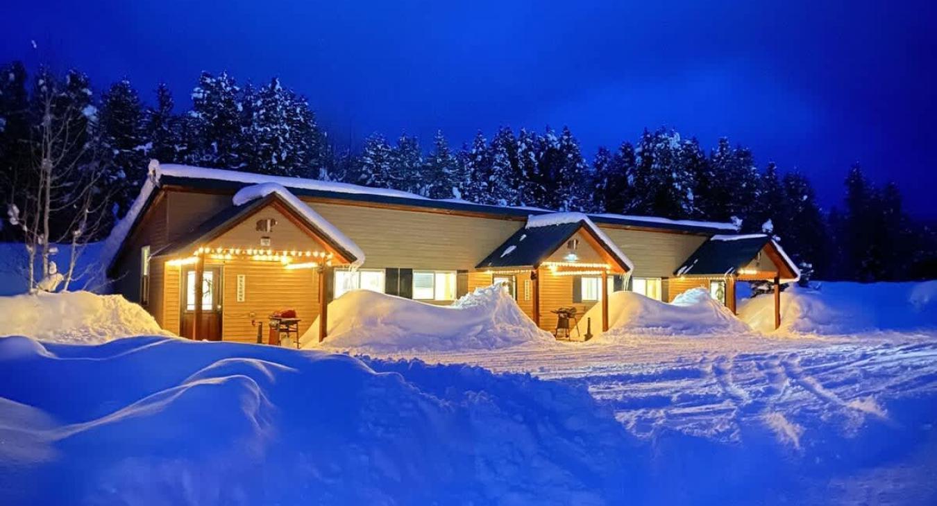 This cabin is adjacent to two other cabins.