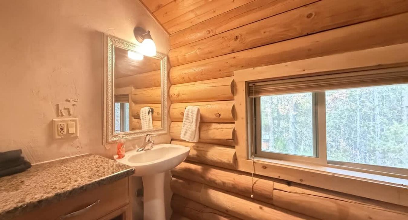 Picture of the sink view from the upstairs bathroom.