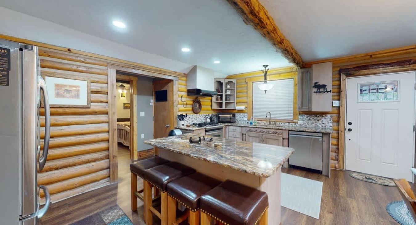 Full size kitchen with extra seating at the island.