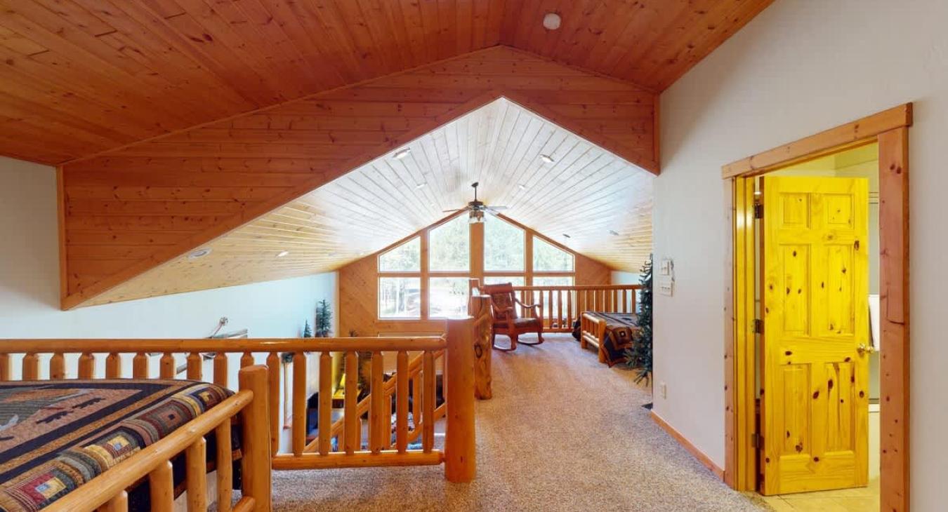 The large windows bring in lots of natural light to the loft.