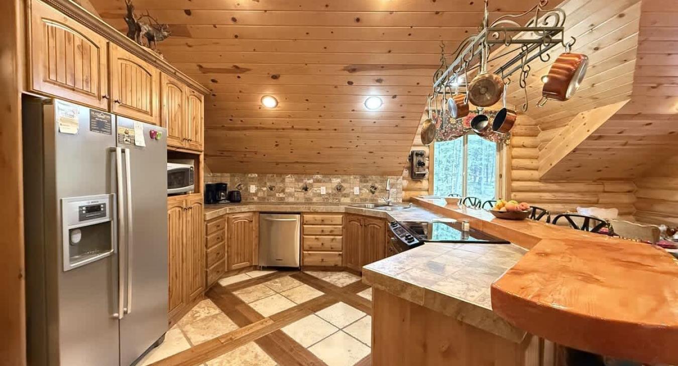 Full size kitchen with appliances, pots and pans, dishes, utensils, and basic cooking essentials