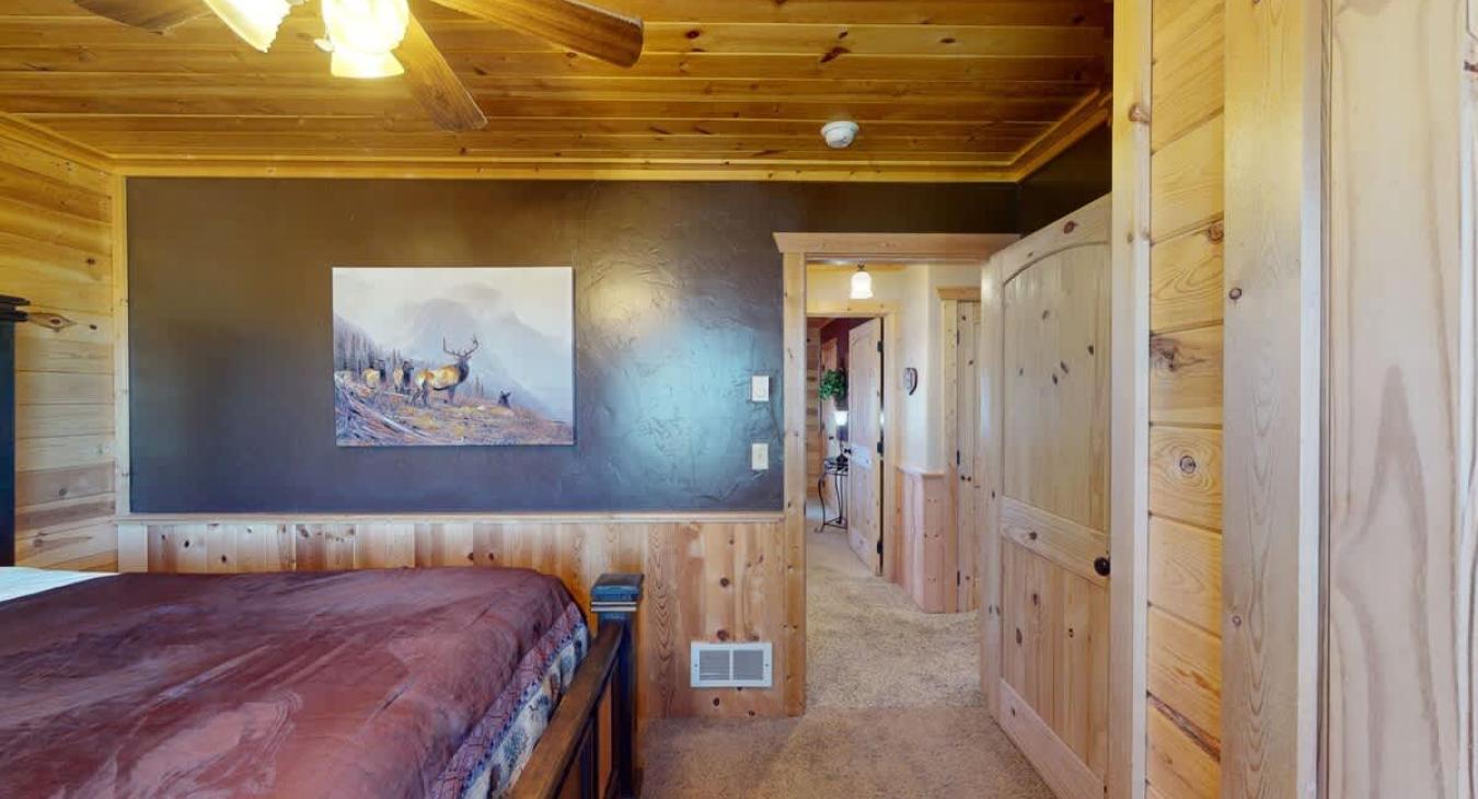 From the bedroom another bedroom is located across the hall.