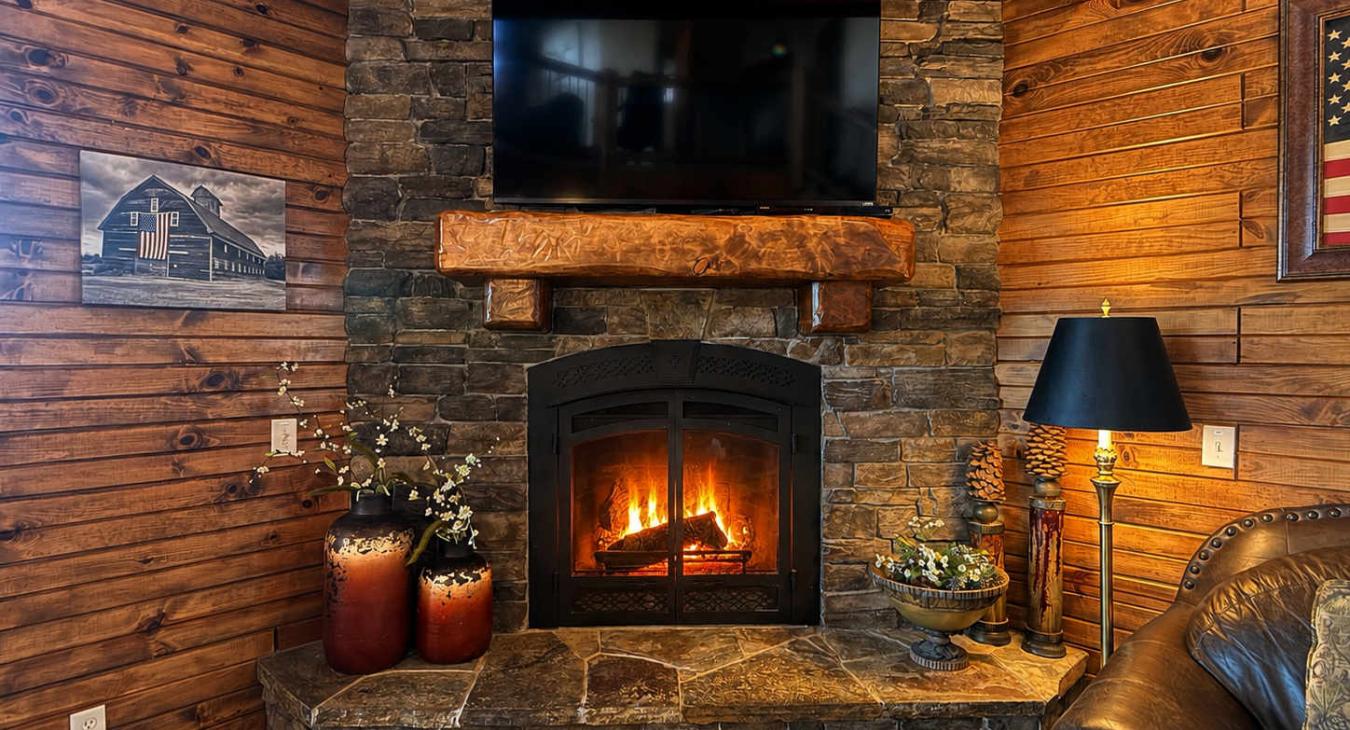 Cozy up by the easy-to-use propane fireplace—no wood needed! Unwind on the plush leather sofa for a warm, relaxing evening.