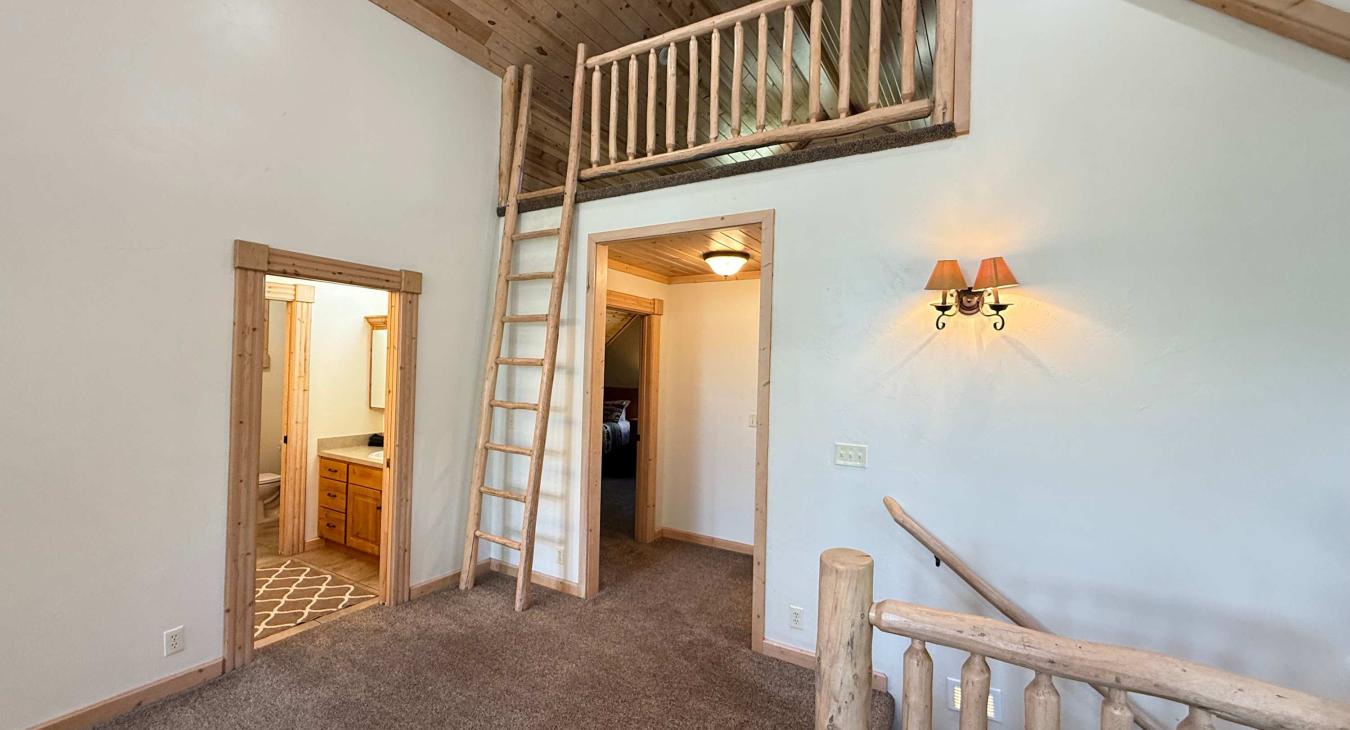 Small kids loft for playing. Full bathroom at the top of the stairs.