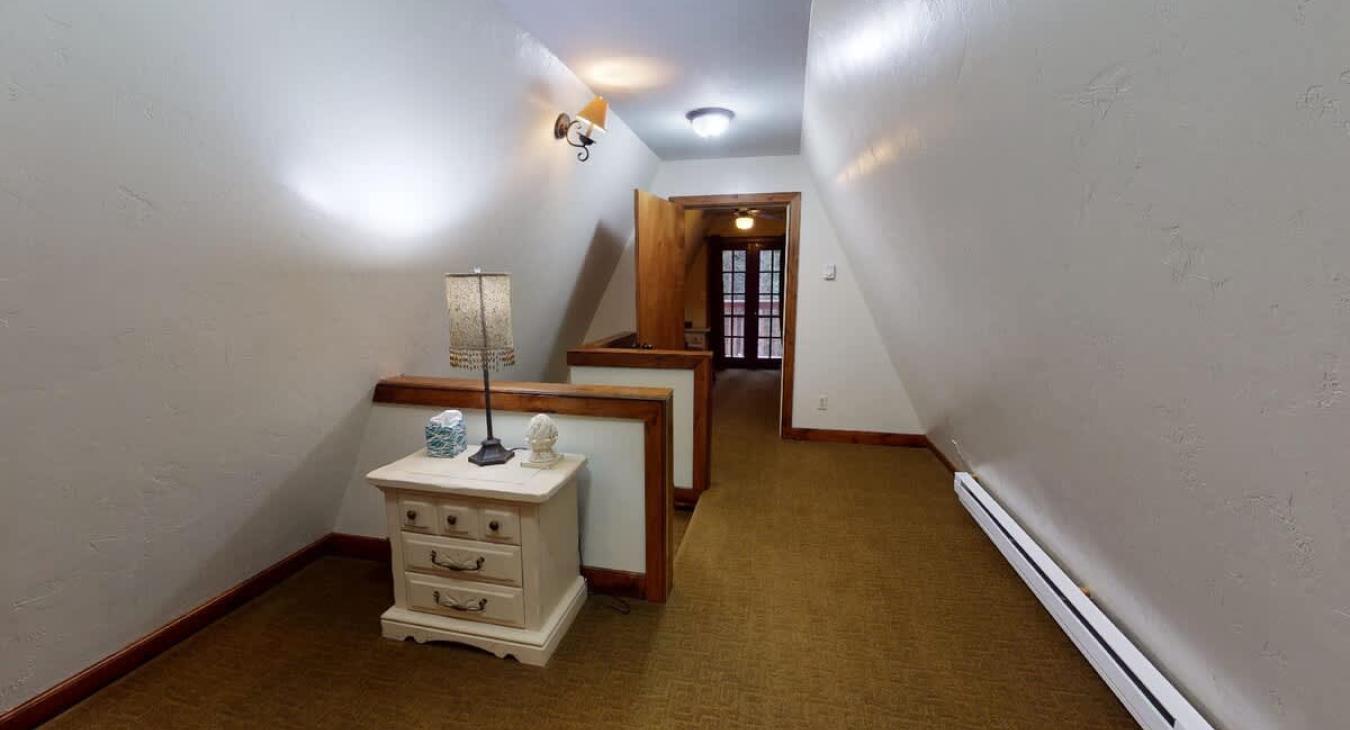 The loft area above the stairs.