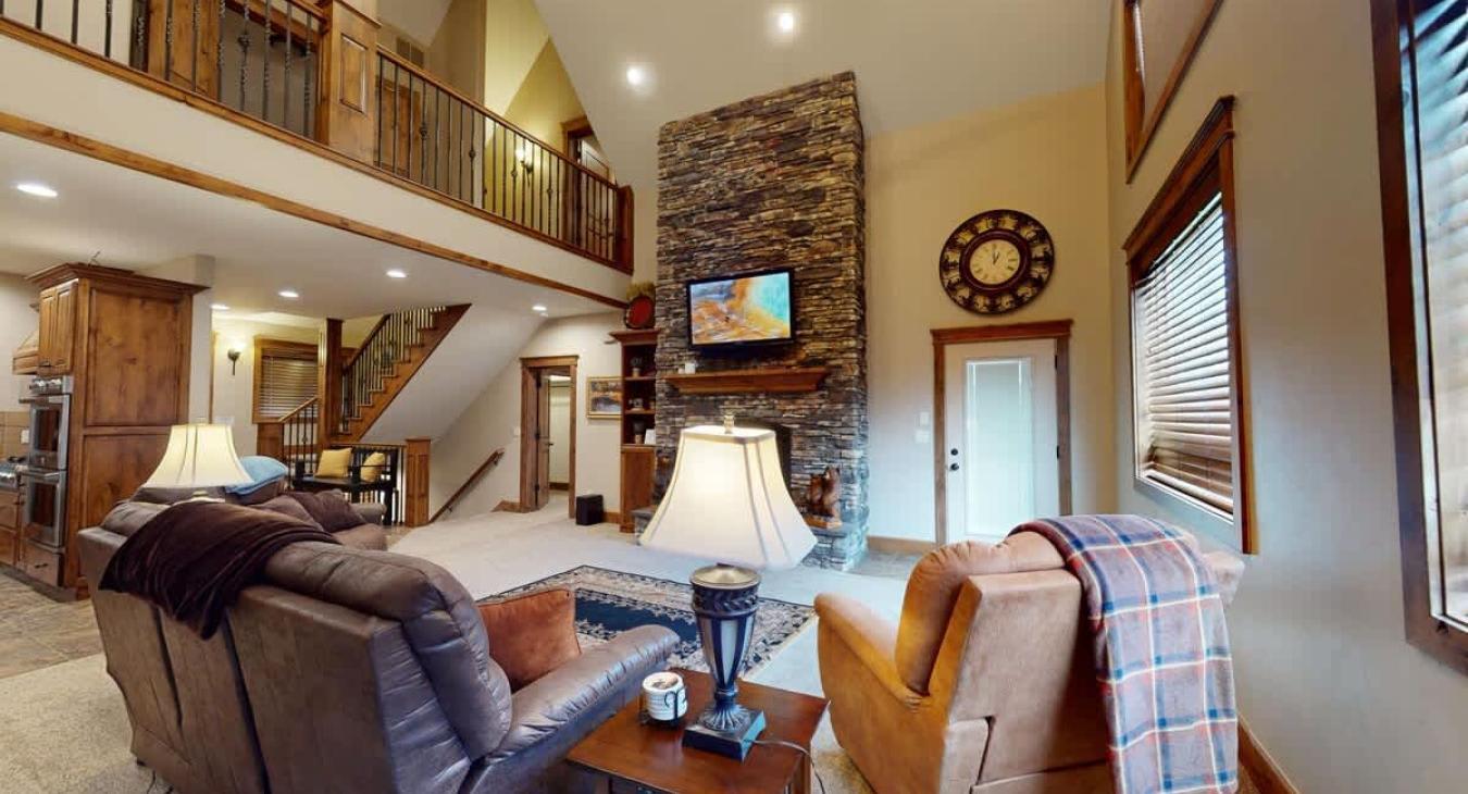 Large windows illuminate the area making it feel like the perfect cozy space.