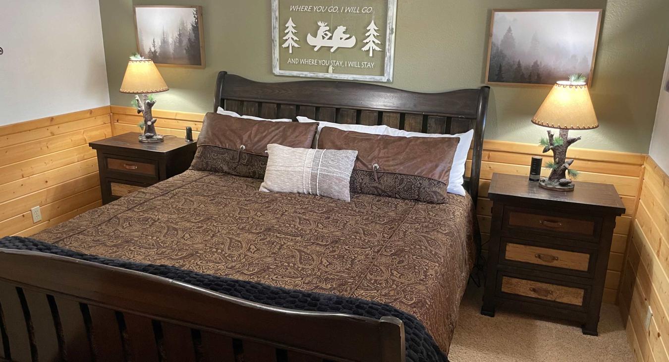 Master bedroom with new king bed and comfortable mattress.