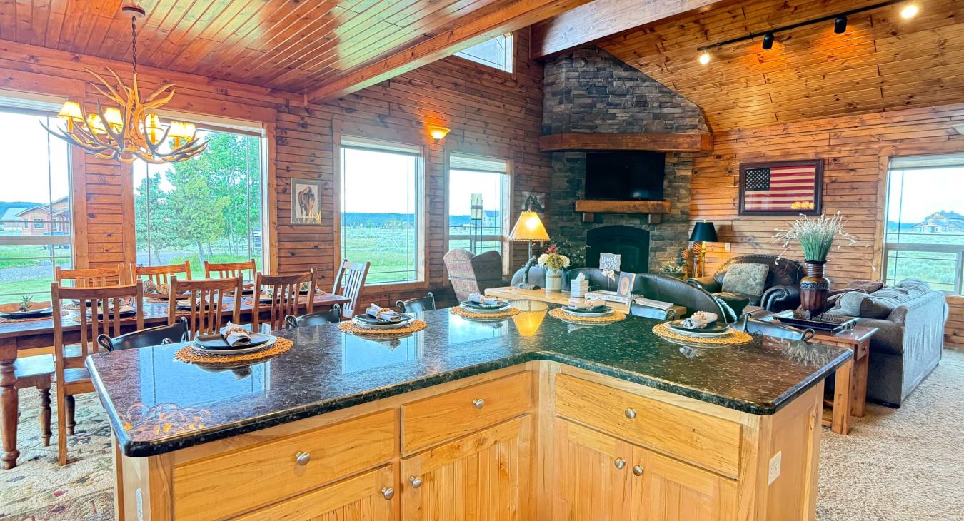 The open-concept kitchen looks out into the dining area and living room, keeping everyone connected during meal prep and family time.