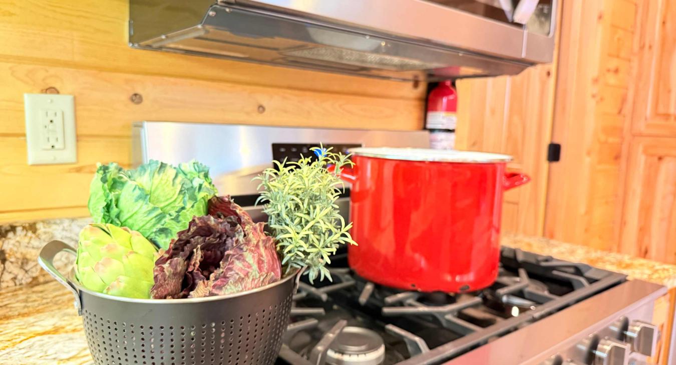 A chef's delight! Whip up hearty family meals on the premium stainless steel gas range, completely stocked with quality cookware and essentials.
