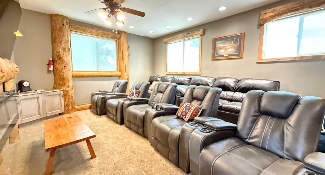 Spacious and incredibly inviting, the theater loft handles large groups with ease, offering endless comfort for late-night entertainment.
