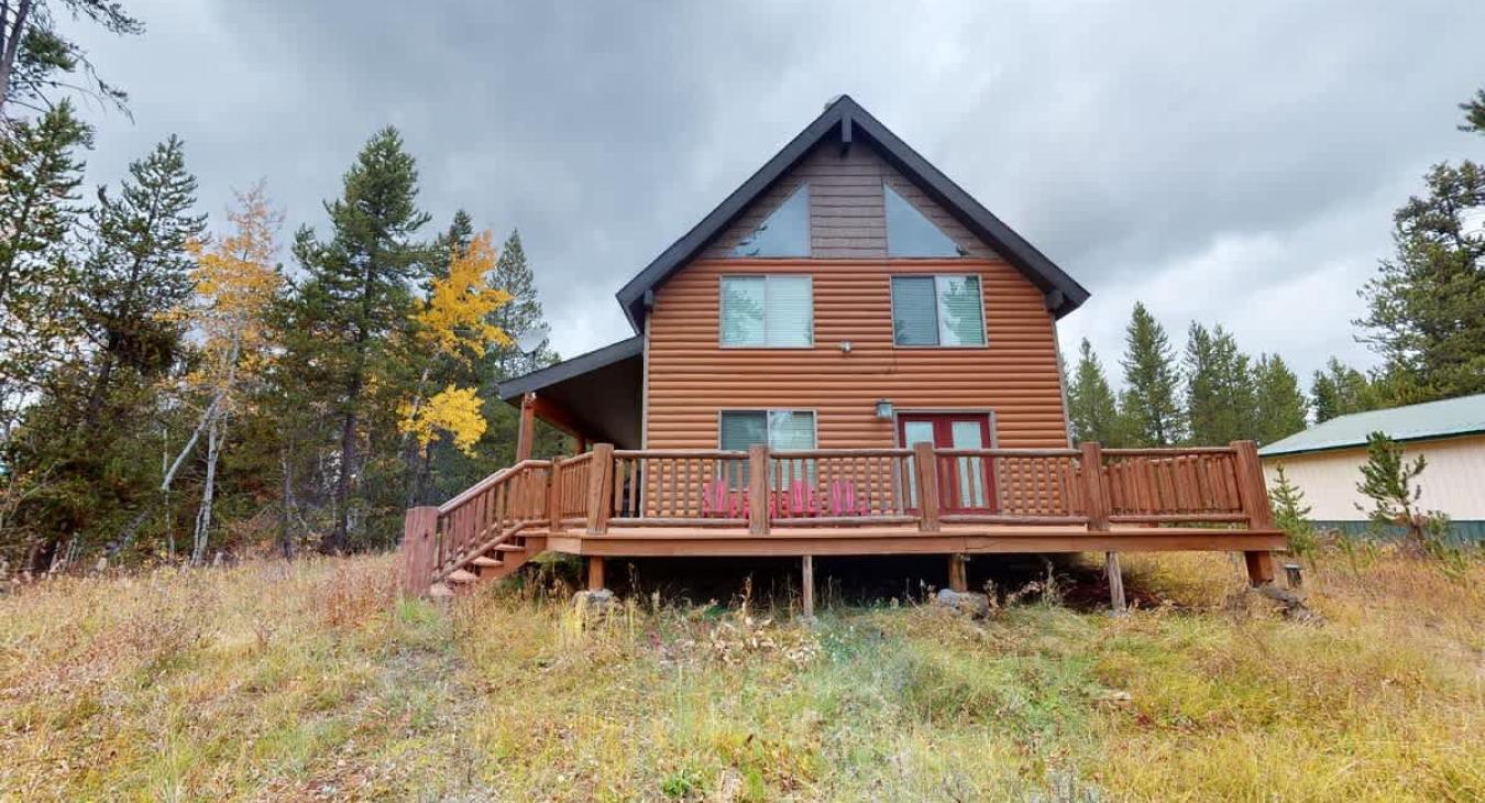 We hope you enjoy your stay at Mangy Moose! Relax and take in the fresh mountain air from our grand wrap-around deck, beautifully designed for your ultimate comfort.