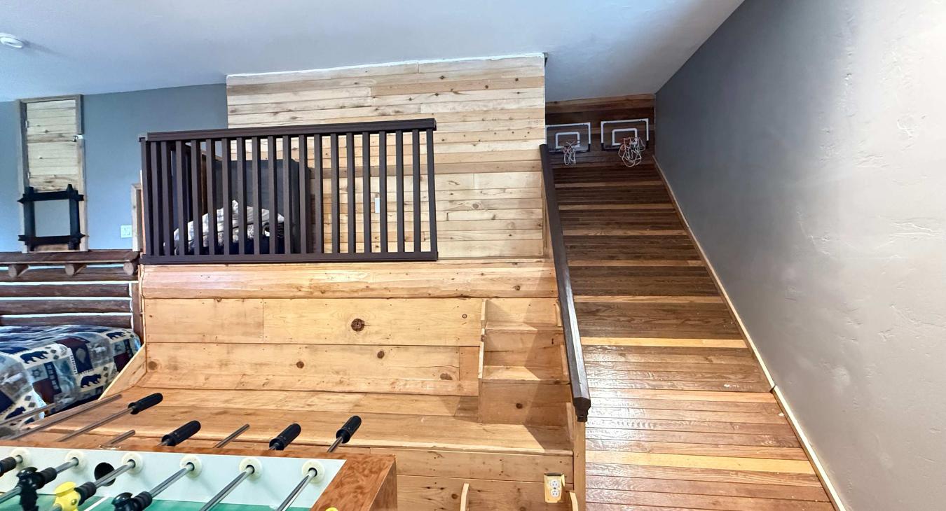 An absolute highlight for families! This unique game room features basketball hoops for rainy-day excitement.