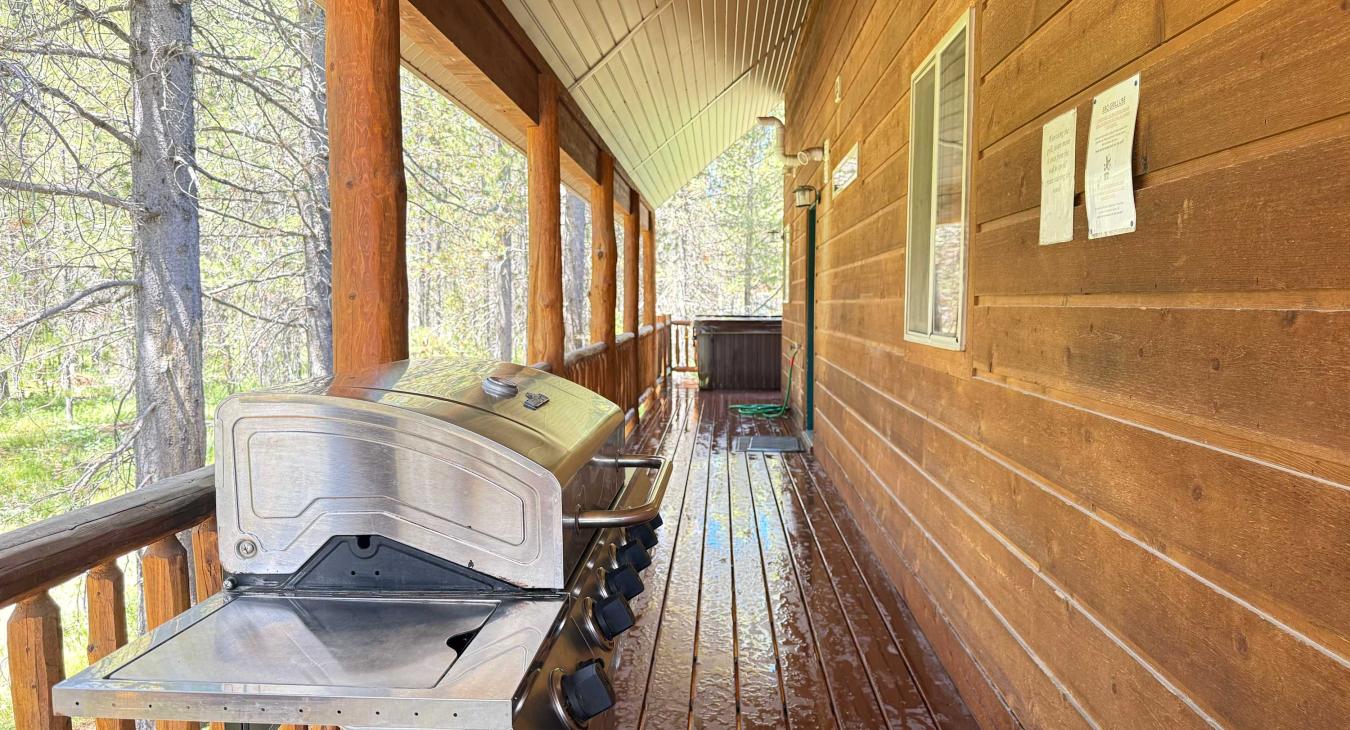 Open porch to the hot tub. Grill right off the kitchen.