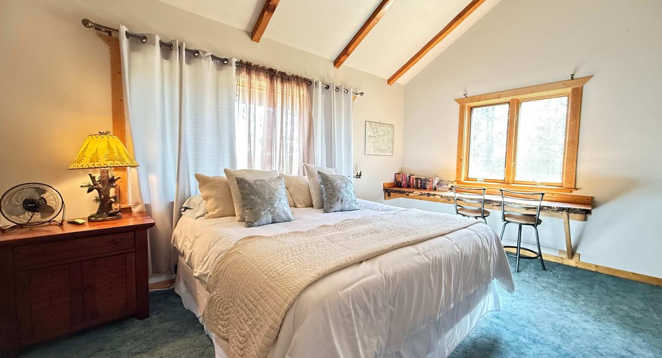 Sink into the Master bedroom king bed, with a futon, twin and full size beds.