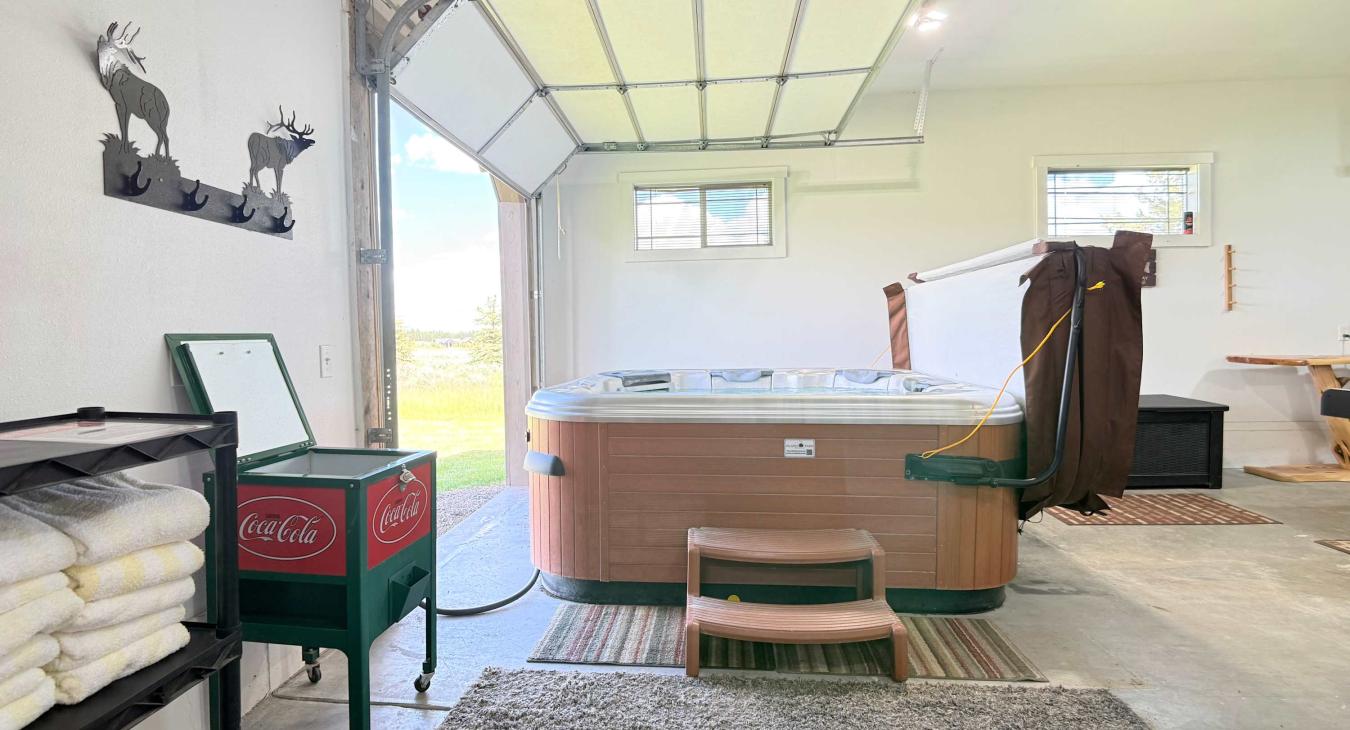 Soak in the indoor hot tub with the garage door open to catch the fresh mountain air, complete with complementary towels and a cooler.