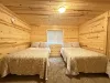 Bedroom #5 located downstairs with two Double beds.