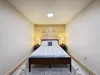 Basement bedroom #1 with a queen bed.