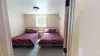 Bedroom #5 located in the basement with 2 Double beds.