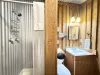 Standing shower in the bathroom.