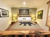 The master bedroom is easily located downstairs.