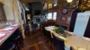 Seating is available at the dining table and the kitchen island for everyone to enjoy their meals.