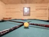 Full size pool table for those friendly pool matches.