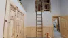 Ladder to access the small loft area in this room.