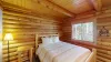 Bedroom #2 located on the main level with a Queen size bed.