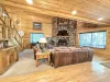 Main level living room with fireplace. Make sure to bring your own firewood.