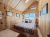 Main bedroom with a Queen size bed.