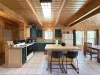 Full kitchen with island to prepare food. Appliances, basic spices, dishes, and silverware are provided.